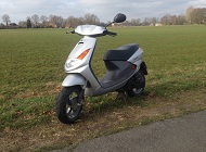 scooter met blauw kenteken